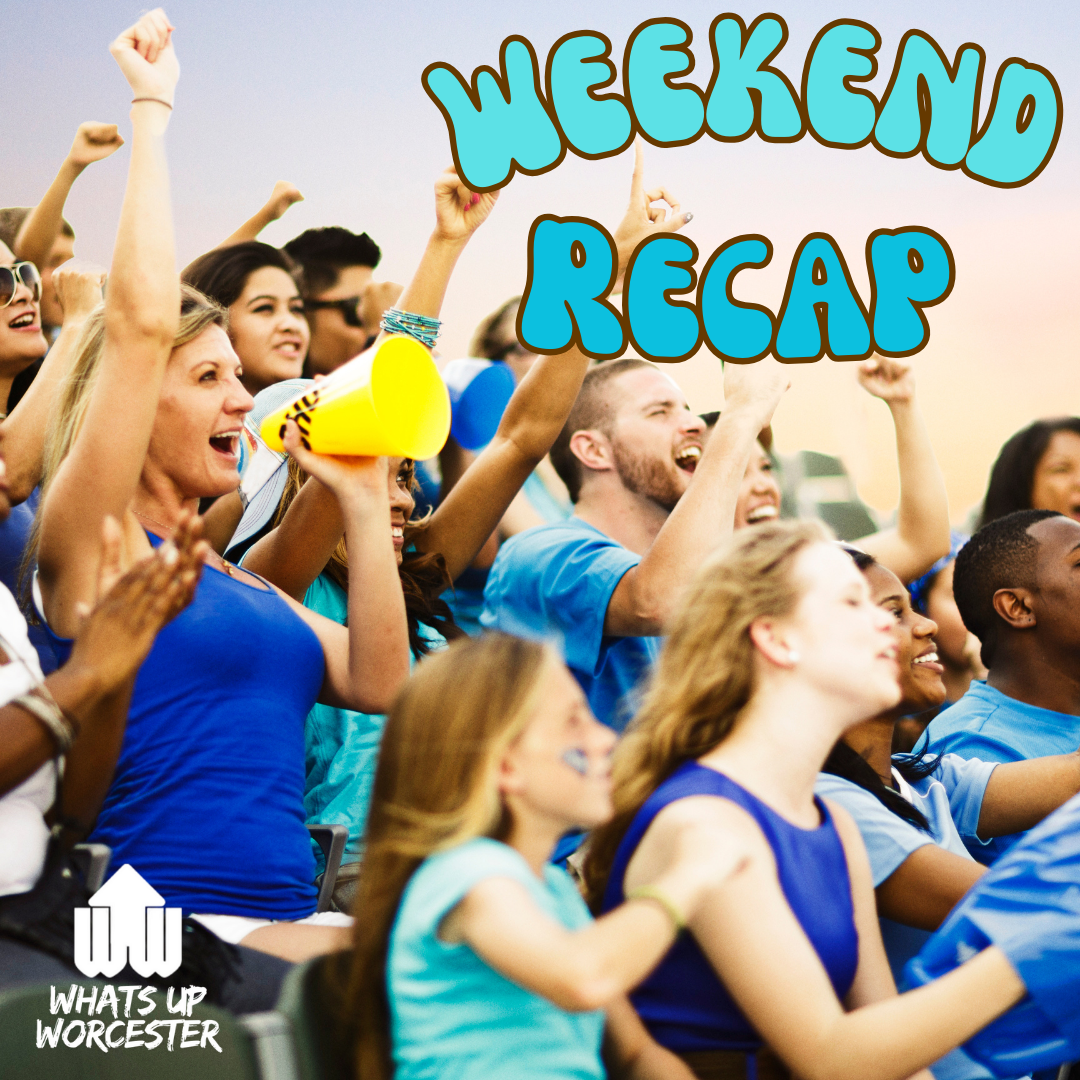 a group of people in blue shirts